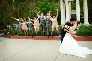 Wedding party at white monument by Abbey Kyhl